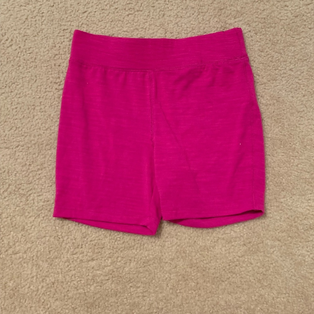 Tight pink athletic shorts